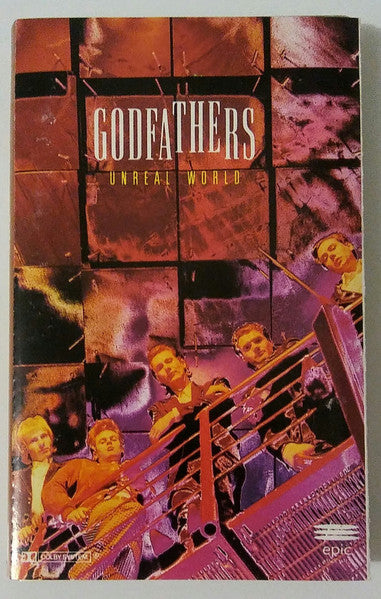 GODFATHERS - UNREAL WORLD (CASSETTE) - CS