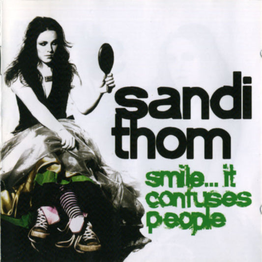 THOM, SANDI - SMILE...IT CONFUSES PEOPLE - CD